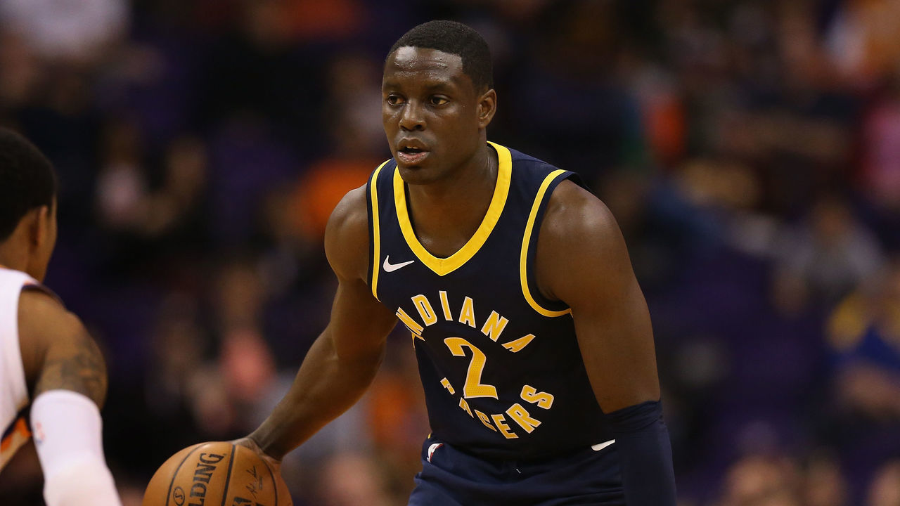 PHOENIX, AZ - JANUARY 14: Darren Collison #2 of the Indiana Pacers moves the ball upcourt against Tyler Ulis #8 of the Phoenix Suns during the second half of the NBA game at Talking Stick Resort Arena on January 14, 2017 in Phoenix, Arizona.