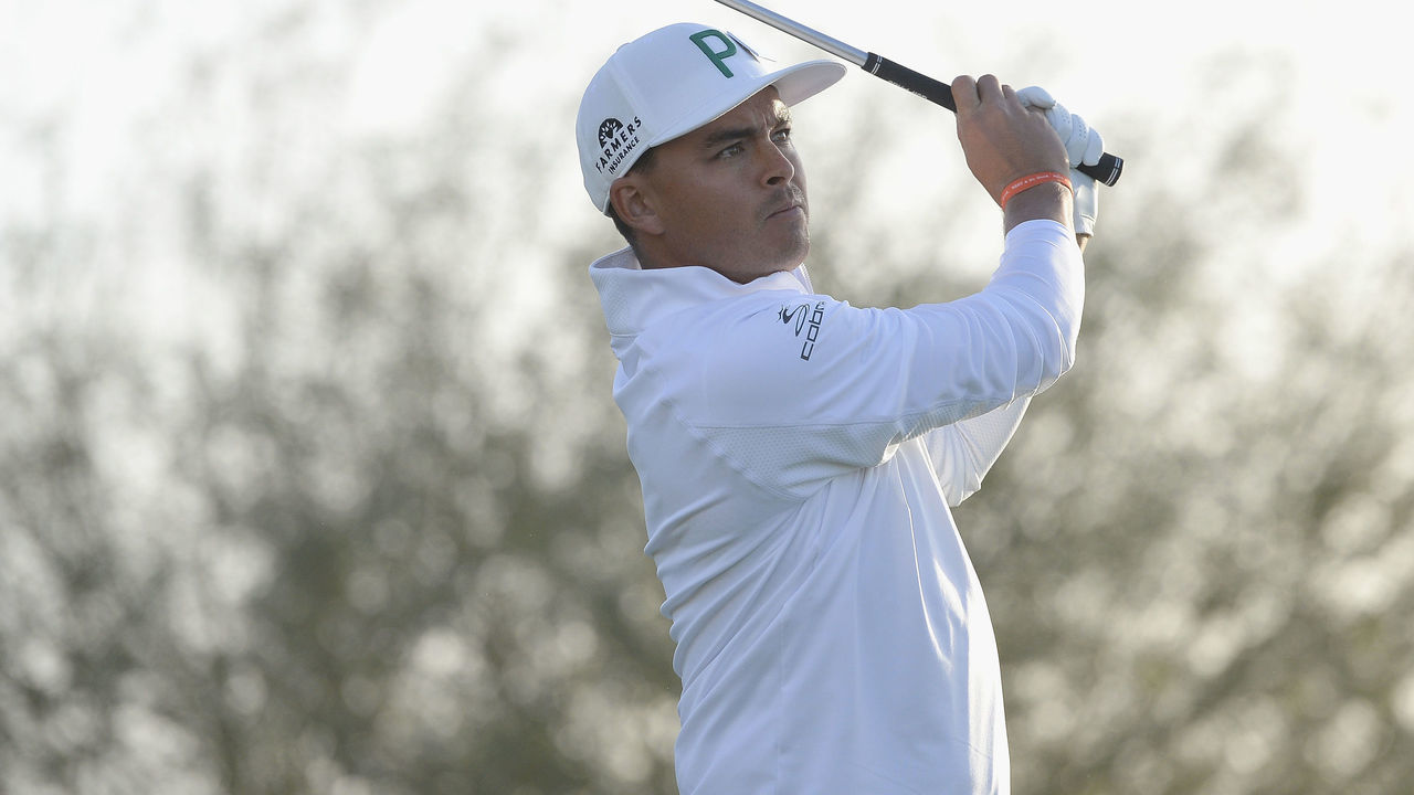 SCOTTSDALE, AZ - FEBRUARY 01: Rickie Fowler watches his tee shot on the 12th hole during the first round of the Waste Management Phoenix Open at TPC Scottsdale on February 1, 2018 in Scottsdale, Arizona.