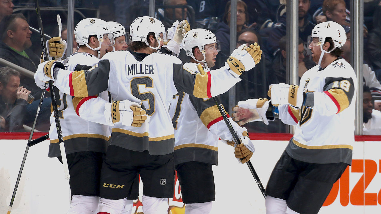 WINNIPEG, MB - FEBRUARY 1: James Neal #18 of the Vegas Golden Knights joins teammates to celebrate a second period goal against the Winnipeg Jets at the Bell MTS Place on February 1, 2018 in Winnipeg, Manitoba, Canada.