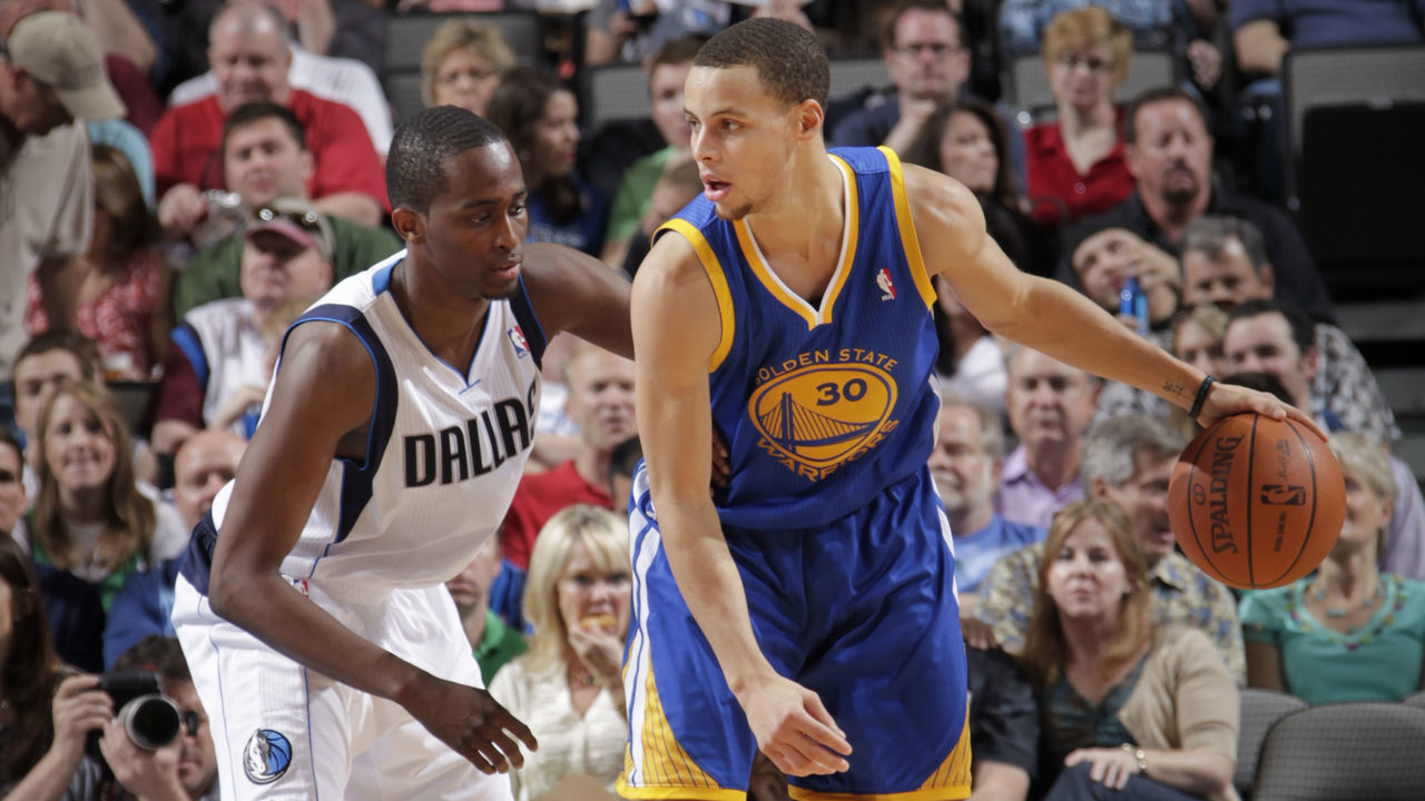 DALLAS, TX - MARCH 20: Stephen Curry #30 of the Golden State Warriors backs down Rodrigue Beaubois #3 of the Dallas Mavericks during a game on March 20, 2011 at the American Airlines Center in Dallas, Texas. Mandatory Copyright Notice: Copyright 2011 NBAE