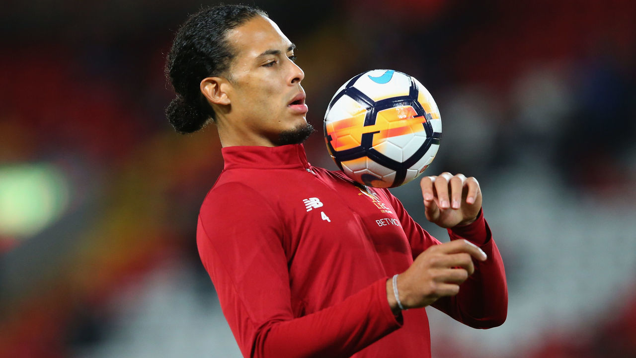 LIVERPOOL, ENGLAND - JANUARY 27: Virgil van Dijk of Liverpool warms up prior to The Emirates FA Cup Fourth Round match between Liverpool and West Bromwich Albion at Anfield on January 27, 2018 in Liverpool, England.