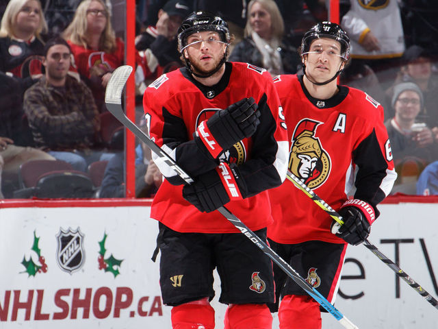 OTTAWA, ON - DECEMBER 13: Bobby Ryan #9 of the Ottawa Senators celebrates his first period goal against the New York Rangers with teammate Mark Stone #61 as they skate to the bench at Canadian Tire Centre on December 13, 2017 in Ottawa, Ontario, Canada.