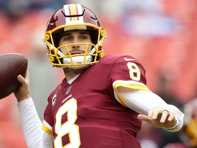LANDOVER, MD - DECEMBER 24: Quarterback Kirk Cousins #8 of the Washington Redskins warms up before a game against the Denver Broncos at FedExField on December 24, 2017 in Landover, Maryland.