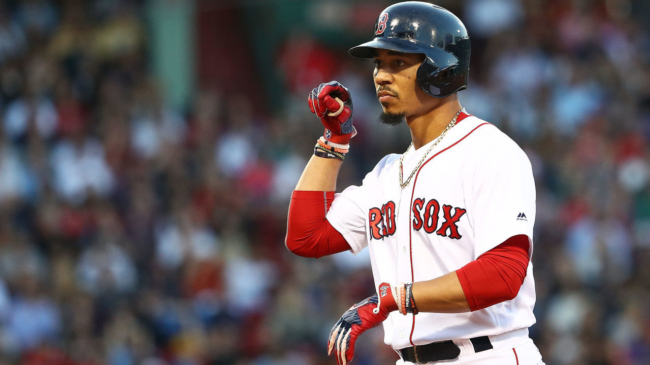 BOSTON, MA - JUNE 28: Mookie Betts #50 of the Boston Red Sox reacts after hitting a single during the third inning of a game against the Minnesota Twins on June 28, 2017 at Fenway Park in Boston, Massachusetts.