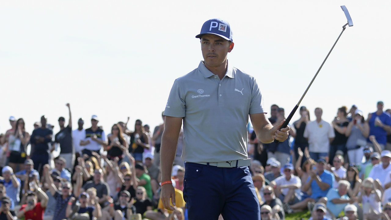 SCOTTSDALE, AZ - FEBRUARY 02: Rickie Fowler makes a birdie putt on the 10th hole during the second round of the Waste Management Phoenix Open at TPC Scottsdale on February 2, 2018 in Scottsdale, Arizona.