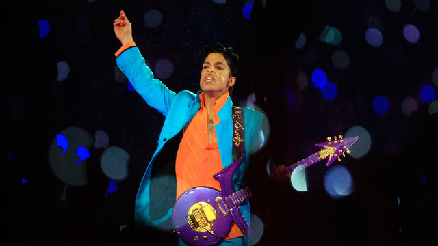MIAMI GARDENS, FL - FEBRUARY 04: Prince performs in the rain during the 'Pepsi Halftime Show' at Super Bowl XLI between the Indianapolis Colts and the Chicago Bears on February 4, 2007 at Dolphin Stadium in Miami Gardens, Florida.