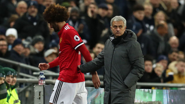 LONDON, ENGLAND - JANUARY 31: Jose Mourinho the head coach / manager of Manchester United with Marouane Fellaini of Manchester United as he is substituted during the Premier League match between Tottenham Hotspur and Manchester United at Wembley Stadium on January 31, 2018 in London, England.