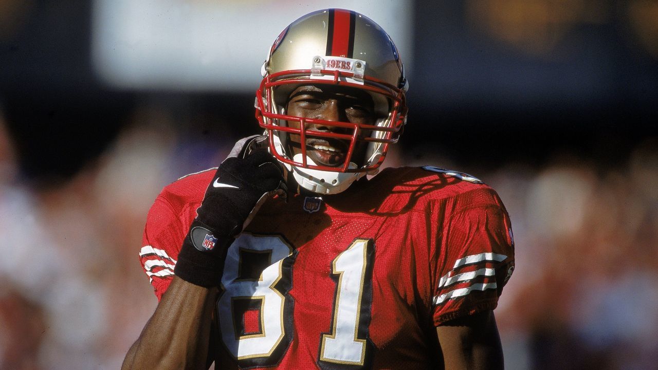 29 Oct 2000: Terrell Owens #81 of the San Francisco 49ers clips his chin strap during a game against the St. Louis Rams at 3Com Park in San Francisco, California. The Rams defeated the 49ers 34-24.Mandatory Credit: Harry How /Allsport
