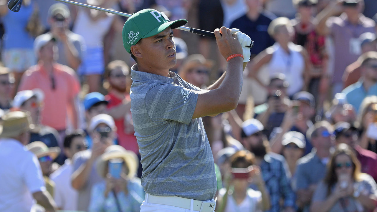 SCOTTSDALE, AZ - FEBRUARY 03: Rickie Fowler watches his tee shot on the eighth hole during the third round of the Waste Management Phoenix Open at TPC Scottsdale on February 3, 2018 in Scottsdale, Arizona.