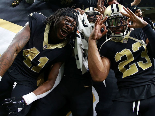 NEW ORLEANS, LA - DECEMBER 24: Alvin Kamara #41 of the New Orleans Saints, Marshon Lattimore #23 and Michael Thomas #13 celebrate after a game against the Atlanta Falcons at the Mercedes-Benz Superdome on December 24, 2017 in New Orleans, Louisiana.