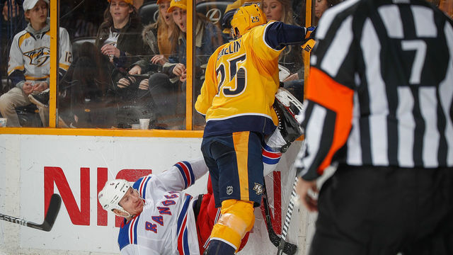 NASHVILLE, TN - FEBRUARY 3: Alexei Emelin #25 of the Nashville Predators checks Cody McLeod #8 of the New York Rangers during an NHL game at Bridgestone Arena on February 3, 2018 in Nashville, Tennessee.