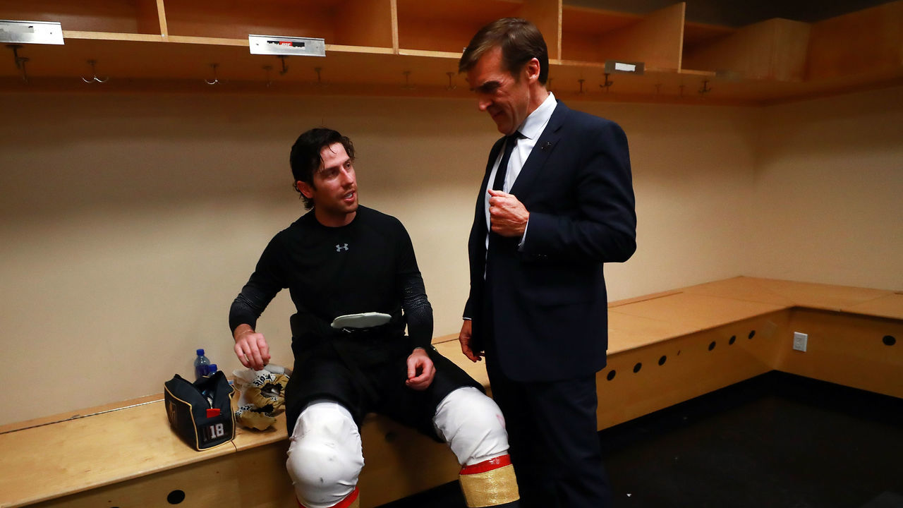 DALLAS, TX - OCTOBER 06: James Neal #18 of the Vegas Golden Knights talks with Vegas Golden Knights general manager George McPhee in the locker room after scoring the first two goals in team history to beat the Dallas Stars 2-1 at American Airlines Center on October 6, 2017 in Dallas, Texas.
