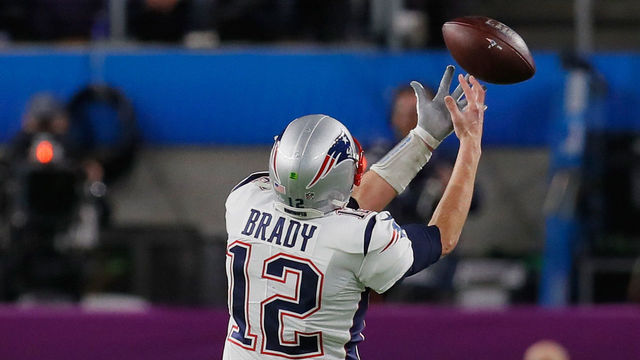 MINNEAPOLIS, MN - FEBRUARY 04: Tom Brady #12 of the New England Patriots drops a pass inteded for him from teammate Rob Gronkowski #87 (not pictured) during the second quarter against the Philadelphia Eagles in Super Bowl LII at U.S. Bank Stadium on February 4, 2018 in Minneapolis, Minnesota.