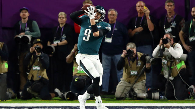 MINNEAPOLIS, MN - FEBRUARY 04: Nick Foles #9 of the Philadelphia Eagles makes a 1-yard touchdown reception against the New England Patriots during the second quarter in Super Bowl LII at U.S. Bank Stadium on February 4, 2018 in Minneapolis, Minnesota.