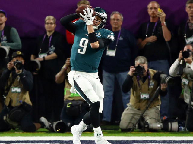MINNEAPOLIS, MN - FEBRUARY 04: Nick Foles #9 of the Philadelphia Eagles makes a 1-yard touchdown reception against the New England Patriots during the second quarter in Super Bowl LII at U.S. Bank Stadium on February 4, 2018 in Minneapolis, Minnesota.
