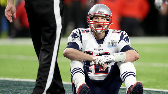 MINNEAPOLIS, MN - FEBRUARY 04: Tom Brady #12 of the New England Patriots reacts after fumbling against the Philadelphia Eagles during the fourth quarter in Super Bowl LII at U.S. Bank Stadium on February 4, 2018 in Minneapolis, Minnesota.