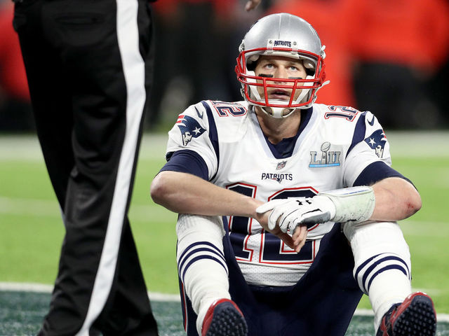 MINNEAPOLIS, MN - FEBRUARY 04: Tom Brady #12 of the New England Patriots reacts after fumbling against the Philadelphia Eagles during the fourth quarter in Super Bowl LII at U.S. Bank Stadium on February 4, 2018 in Minneapolis, Minnesota.