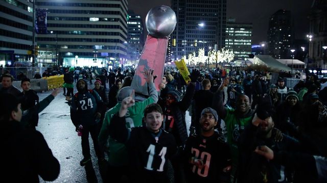 PHILADELPHIA, PA - FEBRUARY 05: Fans celebrate the Philadelphia Eagles' victory in Super Bowl LII game against the New England Patriots on February 5, 2018 in Philadelphia, Pennsylvania..