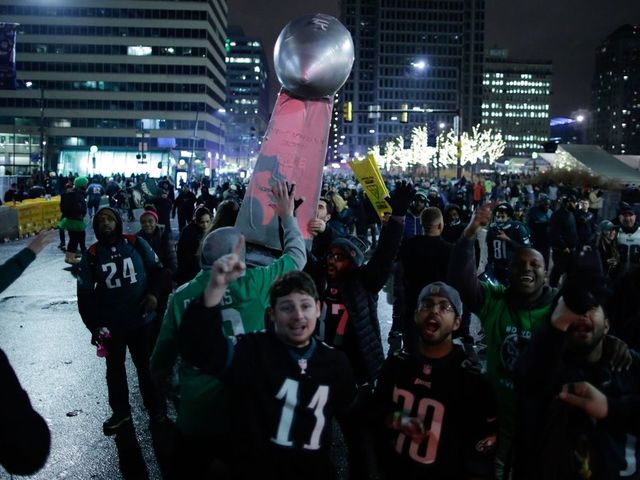 PHILADELPHIA, PA - FEBRUARY 05: Fans celebrate the Philadelphia Eagles' victory in Super Bowl LII game against the New England Patriots on February 5, 2018 in Philadelphia, Pennsylvania..