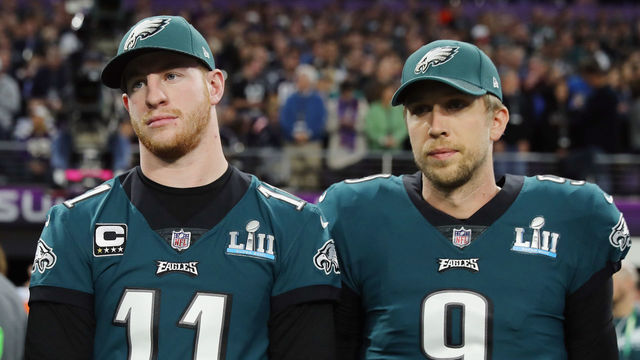 MINNEAPOLIS, MN - FEBRUARY 04: Malcolm Jenkins #27, Carson Wentz #11 and Nick Foles #9 of the Philadelphia Eagles stand for the national anthem prior to Super Bowl LII against the New England Patriots at U.S. Bank Stadium on February 4, 2018 in Minneapolis, Minnesota.