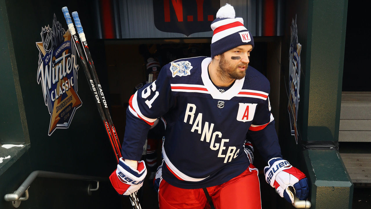 NEW YORK, NY - DECEMBER 31: Rick Nash #61 of the New York Rangers walks out for practice at Citi Field on December 31, 2017 in the Flushing neighborhood of the Queens borough of New York City. The team will take part in the 2018 Bridgestone NHL Winter Classic on New Years Day.