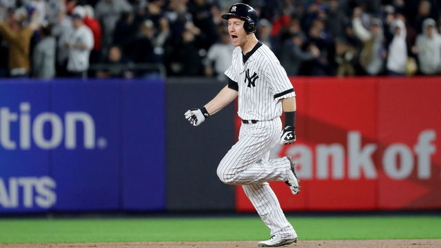 NEW YORK, NY - OCTOBER 16: Todd Frazier #29 of the New York Yankees rounds the bases after hitting a 3-run home run against the Houston Astros during the second inning in Game Three of the American League Championship Series at Yankee Stadium on October 16, 2017 in the Bronx borough of New York City.