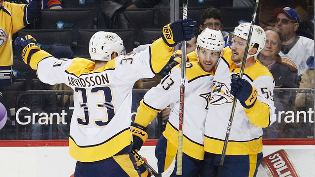 NEW YORK, NY - FEBRUARY 05: Roman Josi #59 of the Nashville Predators celebrates his game-winning goal in overtime against the New York Islanders with teammates Viktor Arvidsson #33 and Nick Bonino #13 on February 5, 2018 at Barclays Center in the Brooklyn borough of New York City.