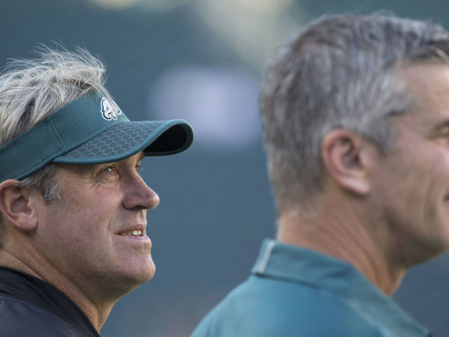 PHILADELPHIA, PA - AUGUST 24: Head coach Doug Pederson and offensive coordinator Frank Reich of the Philadelphia Eagles look on prior to the preseason game against the Miami Dolphins at Lincoln Financial Field on August 24, 2017 in Philadelphia, Pennsylvania. The Eagles defeated the Dolphins 38-31.