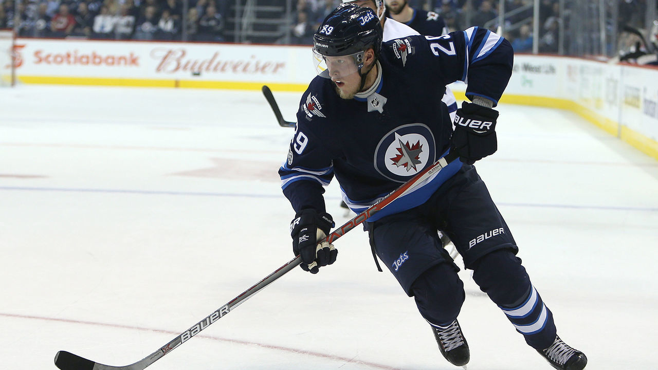 WINNIPEG, MB - OCTOBER 4: Forward Patrik Laine #29 of the Winnipeg Jets skates with the puck during NHL action against the Toronto Maple Leafs on October 4, 2017 at the Bell MTS Place in Winnipeg, Manitoba, Canada.