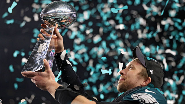 MINNEAPOLIS, MN - FEBRUARY 04: Quarterback Nick Foles #9 of the Philadelphia Eagles raises the Vince Lombardi Trophy after defeating the New England Patriots, 41-33, in Super Bowl LII at U.S. Bank Stadium on February 4, 2018 in Minneapolis, Minnesota.