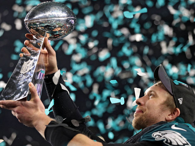 MINNEAPOLIS, MN - FEBRUARY 04: Quarterback Nick Foles #9 of the Philadelphia Eagles raises the Vince Lombardi Trophy after defeating the New England Patriots, 41-33, in Super Bowl LII at U.S. Bank Stadium on February 4, 2018 in Minneapolis, Minnesota.