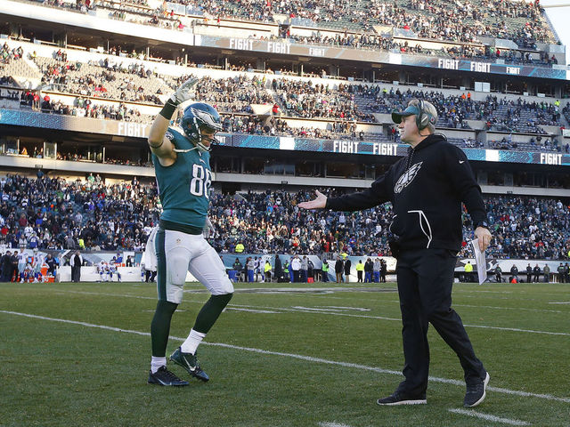 PHILADELPHIA, PA - JANUARY 01: Head coach Doug Pederson of the Philadelphia Eagles congratulates Zach Ertz #86 in the final moments of a game against the Dallas Cowboys at Lincoln Financial Field on January 1, 2017 in Philadelphia, Pennsylvania. The Eagles defeated the Cowboys 27-13.
