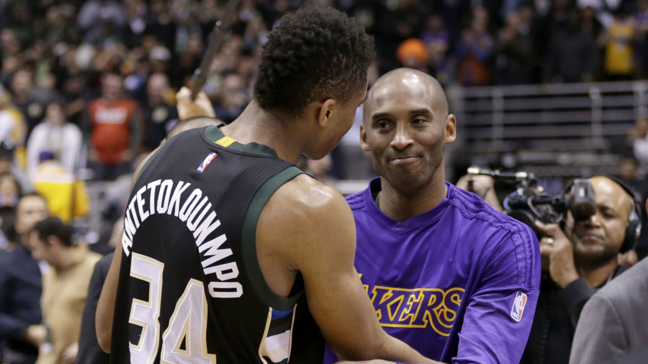 MILWAUKEE, WI - FEBRUARY 22: Kobe Bryant #24 of the Los Angeles Lakers hugs Giannis Antetokounmpo #34 of the Milwaukee Bucks after the game against the Milwaukee Bucks at BMO Harris Bradley Center on February 22, 2016 in Milwaukee, Wisconsin.