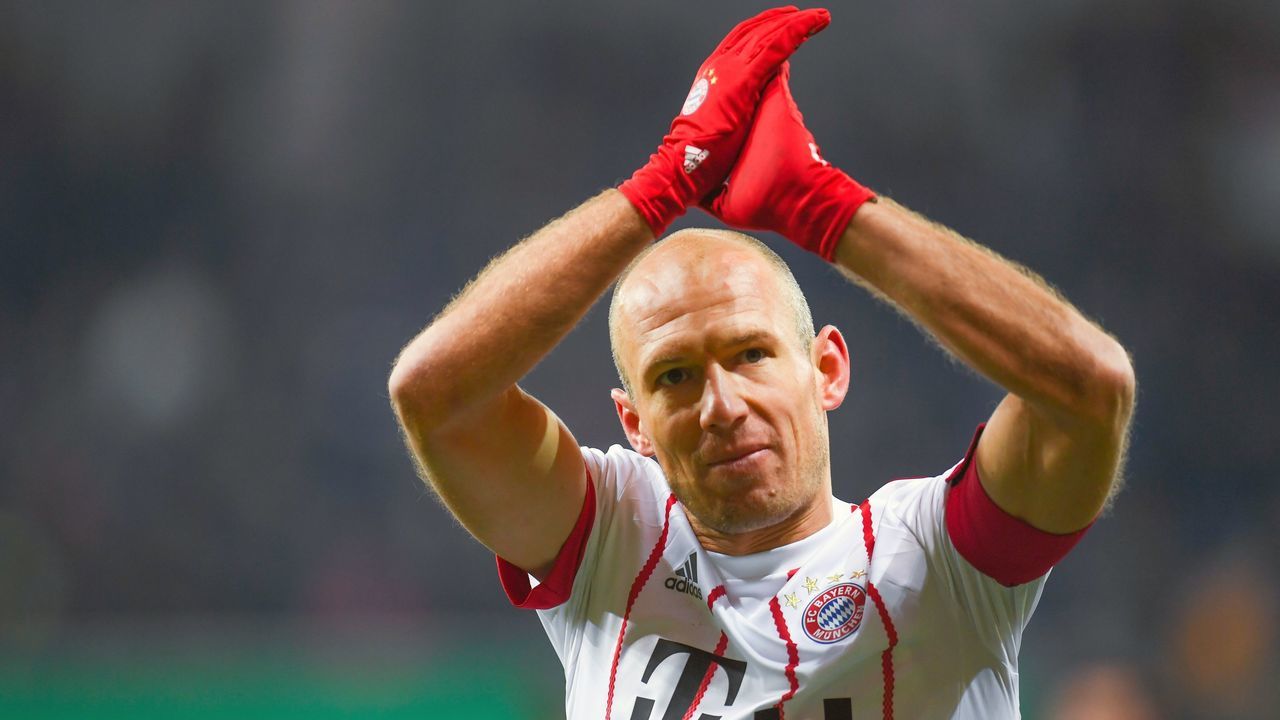 Bayern Munich's Dutch midfielder Arjen Robben celebrates at the end of the German football Cup DFB Pokal quarter-final match SC Paderborn versus Bayern Munich on February 6, 2018 in Paderborn. Bayern Munich won 6-0. / AFP PHOTO / Patrik STOLLARZ / RESTRICTIONS: ACCORDING TO DFB RULES IMAGE SEQUENCES TO SIMULATE VIDEO IS NOT ALLOWED DURING MATCH TIME. MOBILE (MMS) USE IS NOT ALLOWED DURING AND FOR FURTHER TWO HOURS AFTER THE MATCH. == RESTRICTED TO EDITORIAL USE == FOR MORE INFORMATION CONTACT DFB DIRECTLY AT +49 69 67880 /