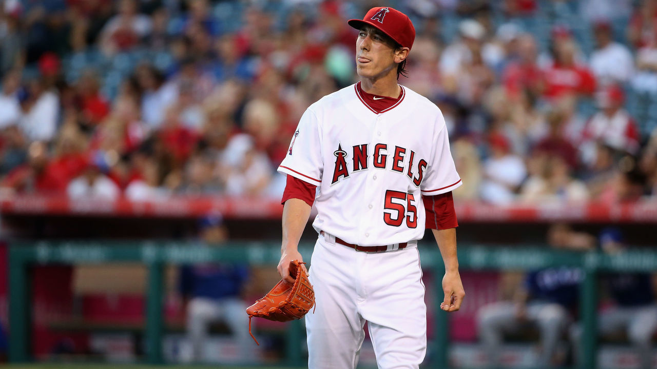 ANAHEIM, CA - JULY 19: Tim Lincecum #55 of the Los Angeles Angels of Anaheim returns to the dugout during the second inning of a baseball game against the Texas Rangers at Angel Stadium of Anaheim on July 19, 2016 in Anaheim, California.