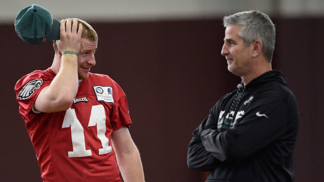 MINNEAPOLIS, MN - FEBRUARY 01: Carson Wentz #11 of the Philadelphia Eagles speaks with offensive coordinator Frank Reich during Super Bowl LII practice on February 1, 2018 at the University of Minnesota in Minneapolis, Minnesota. The Philadelphia Eagles will face the New England Patriots in Super Bowl LII on February 4th.
