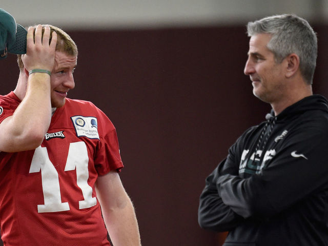 MINNEAPOLIS, MN - FEBRUARY 01: Carson Wentz #11 of the Philadelphia Eagles speaks with offensive coordinator Frank Reich during Super Bowl LII practice on February 1, 2018 at the University of Minnesota in Minneapolis, Minnesota. The Philadelphia Eagles will face the New England Patriots in Super Bowl LII on February 4th.
