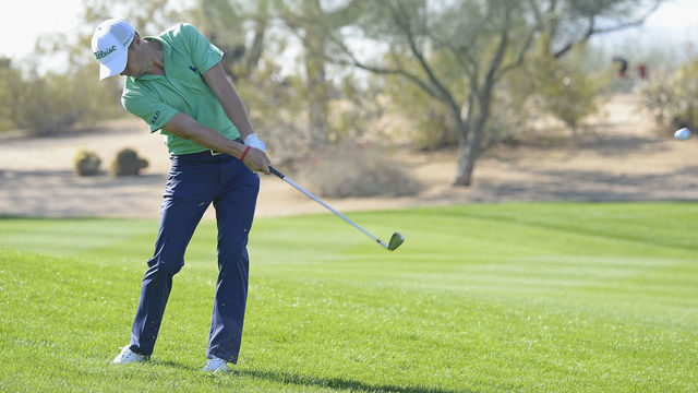 SCOTTSDALE, AZ - FEBRUARY 03: Justin Thomas hits his second shot on the first hole during the third round of the Waste Management Phoenix Open at TPC Scottsdale on February 3, 2018 in Scottsdale, Arizona.