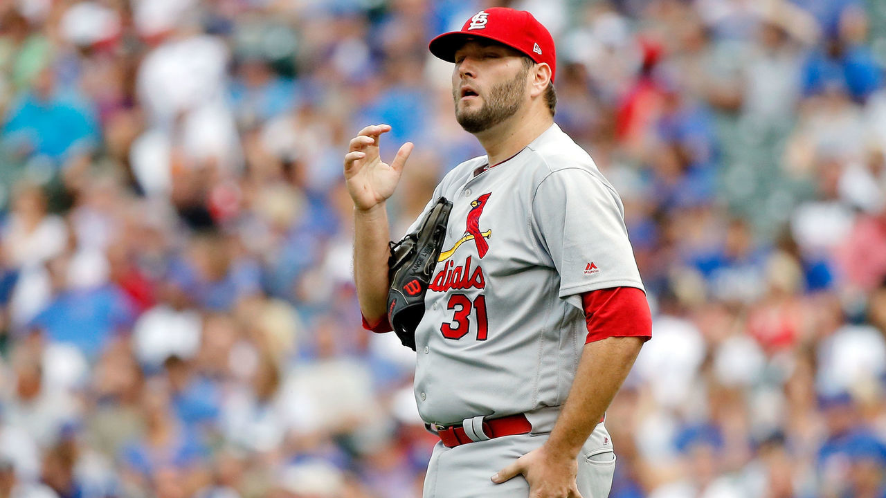CHICAGO, IL - SEPTEMBER 17: Lance Lynn #31 of the St. Louis Cardinals reacts after walking Jose Quintana #62 of the Chicago Cubs (not pictured) during the fourth inning at Wrigley Field on September 17, 2017 in Chicago, Illinois.