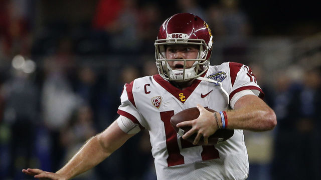 ARLINGTON, TX - DECEMBER 29: Sam Darnold #14 of the USC Trojans scrambles against the Ohio State Buckeyes in the second half of the 82nd Goodyear Cotton Bowl Classic between USC and Ohio State at AT&T Stadium on December 29, 2017 in Arlington, Texas. Ohio State won 24-7.