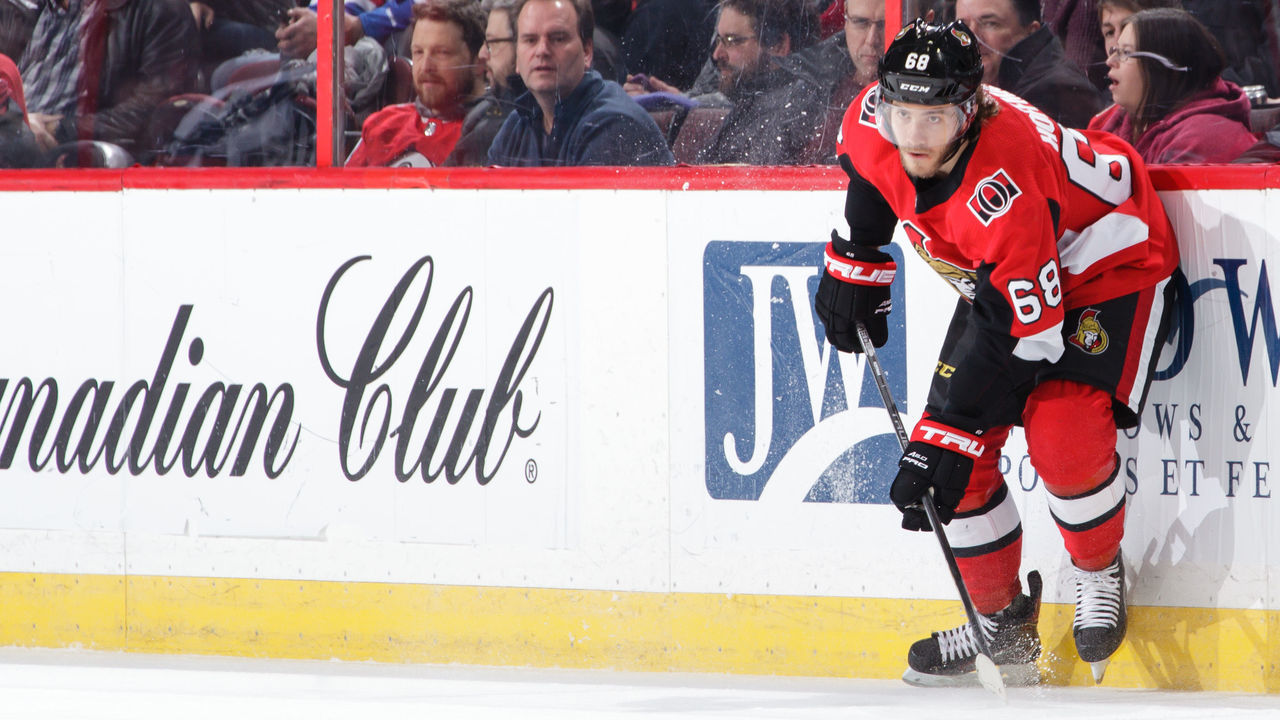 OTTAWA, ON - DECEMBER 4: Mike Hoffman #68 of the Ottawa Senators passes the puck against the New York Rangers at Canadian Tire Centre on December 4, 2017 in Ottawa, Ontario, Canada.
