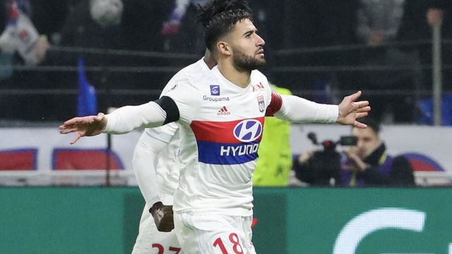 LYON, FRANCE - JANUARY 21: Captain Nabil Fekir (R) of Olympique Lyonnais celebrate his goal with teammattes during the Ligue 1 match between Olympique Lyonnais and Paris Saint Germain (PSG) at Parc OL on January 21, 2018 in Lyon, France.