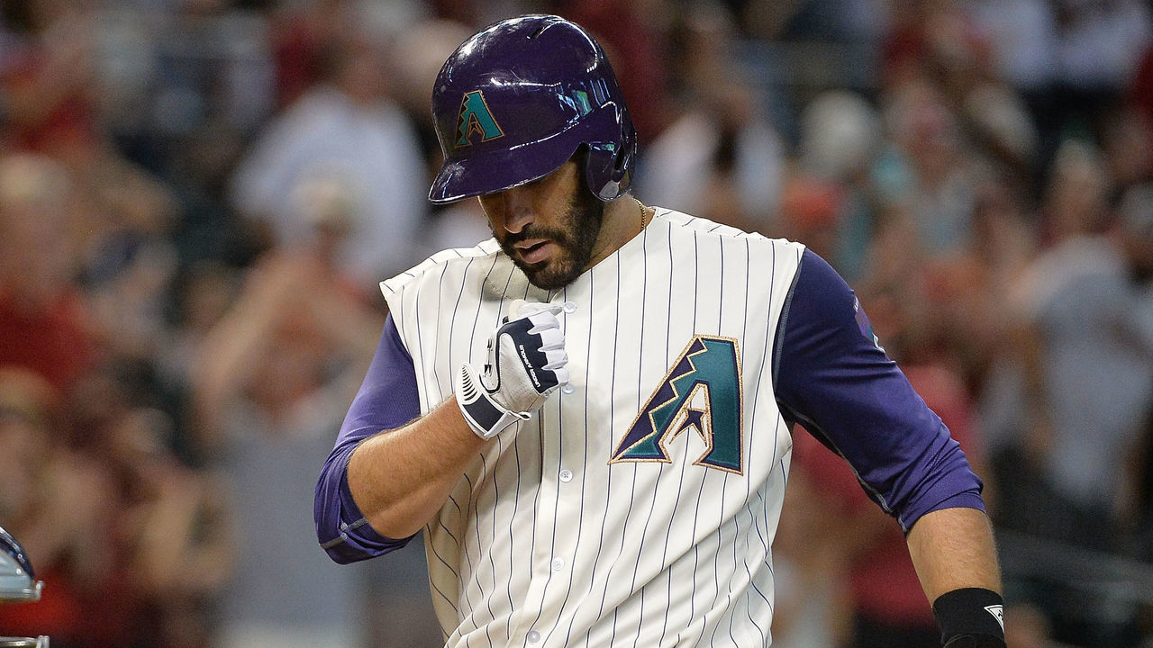 PHOENIX, AZ - SEPTEMBER 14: J.D. Martinez #28 of the Arizona Diamondbacks celebrates hitting a solo home run in the third inning of the MLB game against the Colorado Rockies against at Chase Field on September 14, 2017 in Phoenix, Arizona.