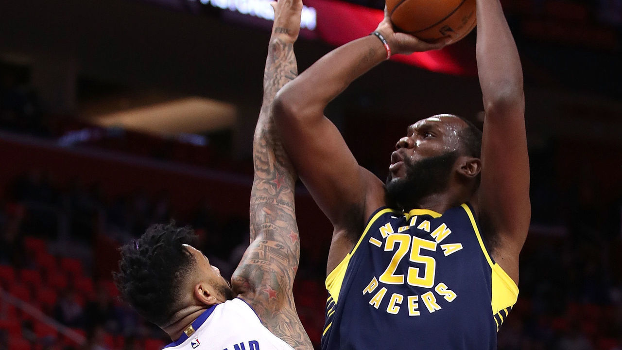 DETROIT, MI - NOVEMBER 08: Al Jefferson #25 of the Indiana Pacers takes a first-half shot over Eric Moreland #24 of the Detroit Pistons at Little Caesars Arena on November 9, 2017 in Detroit, Michigan.