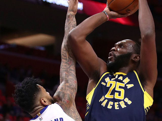 DETROIT, MI - NOVEMBER 08: Al Jefferson #25 of the Indiana Pacers takes a first-half shot over Eric Moreland #24 of the Detroit Pistons at Little Caesars Arena on November 9, 2017 in Detroit, Michigan.