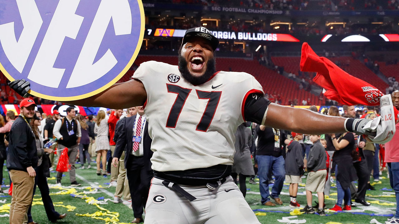 ATLANTA, GA - DECEMBER 02: Isaiah Wynn #77 of the Georgia Bulldogs celebrates beating the Auburn Tigers in the SEC Championship at Mercedes-Benz Stadium on December 2, 2017 in Atlanta, Georgia.