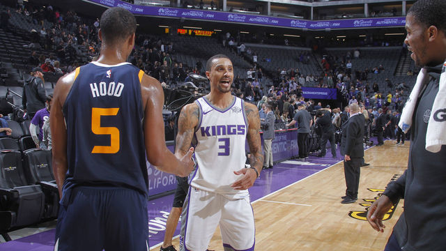 SACRAMENTO, CA - JANUARY 17: George Hill #3 of the Sacramento Kings greets Rodney Hood #5 of the Utah Jazz after the game on January 17, 2018 at Golden 1 Center in Sacramento, California. NOTE TO USER: User expressly acknowledges and agrees that, by downloading and or using this photograph, User is consenting to the terms and conditions of the Getty Images Agreement. Mandatory Copyright Notice: Copyright 2018 NBAE