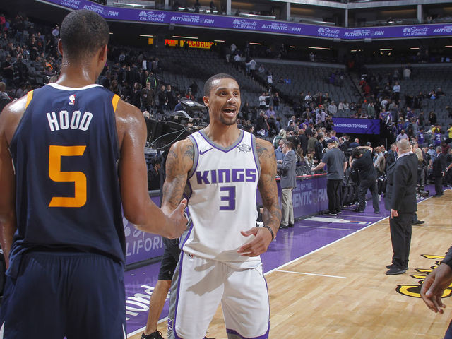 SACRAMENTO, CA - JANUARY 17: George Hill #3 of the Sacramento Kings greets Rodney Hood #5 of the Utah Jazz after the game on January 17, 2018 at Golden 1 Center in Sacramento, California. NOTE TO USER: User expressly acknowledges and agrees that, by downloading and or using this photograph, User is consenting to the terms and conditions of the Getty Images Agreement. Mandatory Copyright Notice: Copyright 2018 NBAE