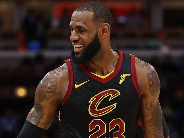 CHICAGO, IL - DECEMBER 04: LeBron James #23 of the Cleveland Cavaliers smiles at the bench against the Chicago Bulls at the United Center on December 4, 2017 in Chicago, Illinois. The Cavaliers defeated the Bulls 113-91.
