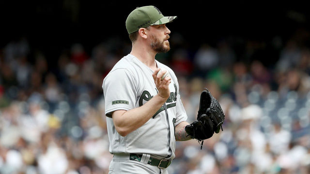 NEW YORK, NY - MAY 28: John Axford #61 of the Oakland Athletics reacts in the eighth inning against the New York Yankees on May 28, 2017 at Yankee Stadium in the Bronx borough of New York City.